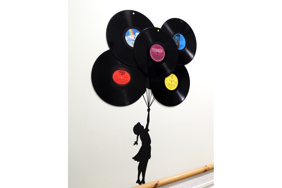 Music themed hallway, vinyl discs on the wall